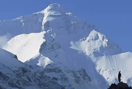 Geladandong is a snow-covered mountain, located in southwestern Qinghai, China, near that province's border with Tibet Autonomous Region. It is the tallest mountain in the Tanggula Mountain Range of the Tibetan Plateau, and the source of the Yangtze River, which begins with glaciers on its surface.