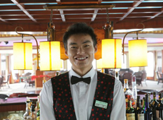 Smiling bar staff on Yangtze Princess