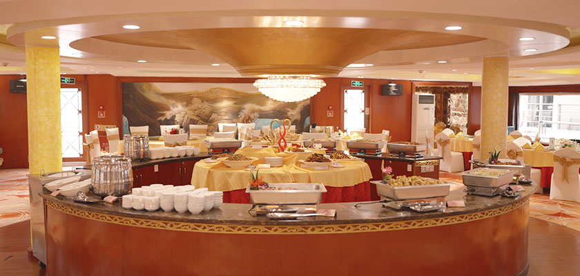 Enjoy a Rich Chinese and Western Buffet Dinner Onboard